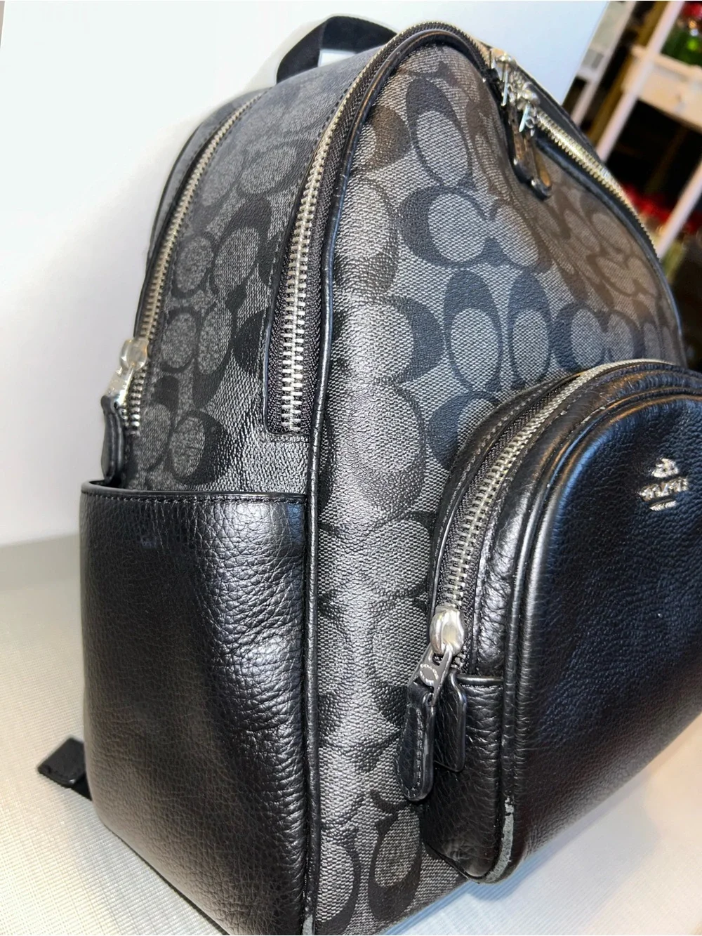 Coach one zip